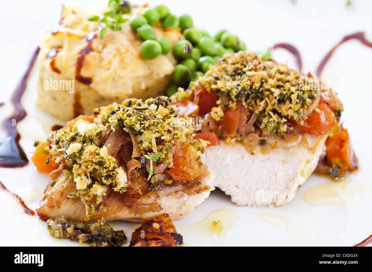 chicken steak with salsa and parmesan crust Stock Photo