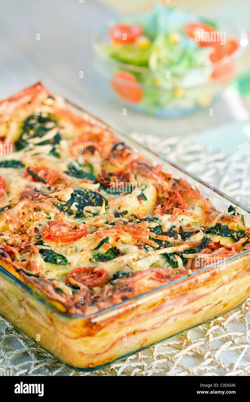 Piece of lasagna on the fork Stock Photo