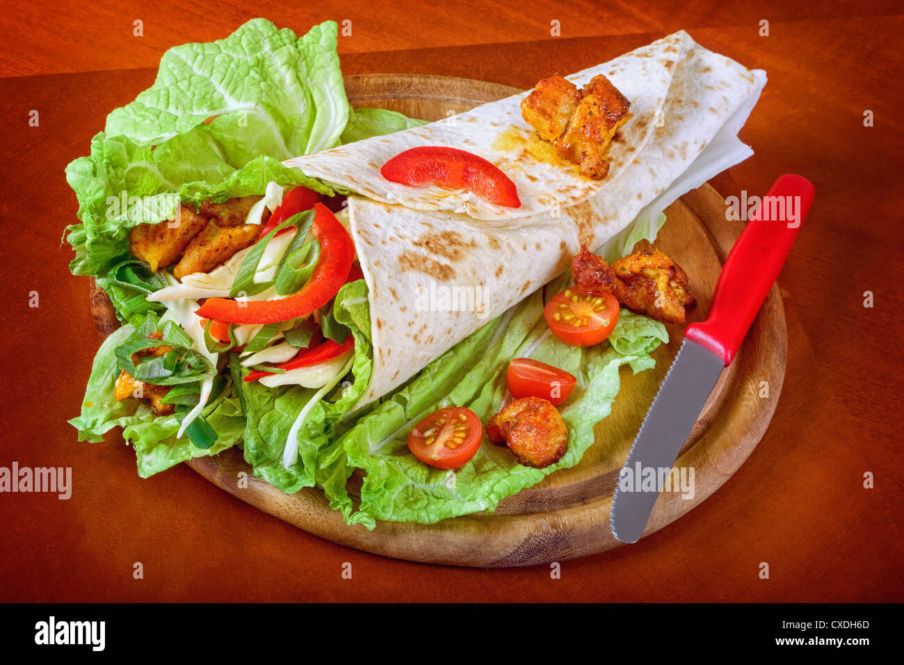 Closeup fresh tortilla on wooden tray Stock Photo