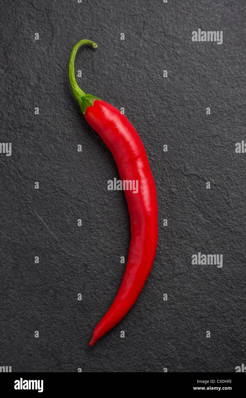 red chili pepper on slate plate Stock Photo