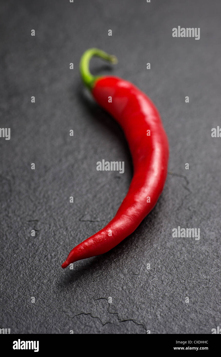 red chili pepper on slate plate Stock Photo