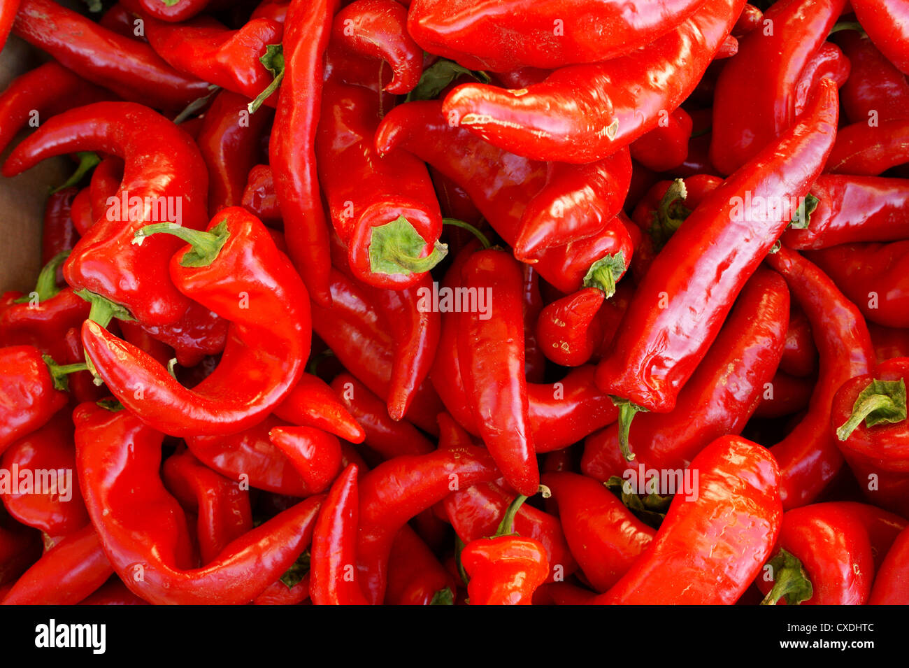 Red chili peppers at a Commercial Street market, Vancouver, BC, Canada Stock Photo