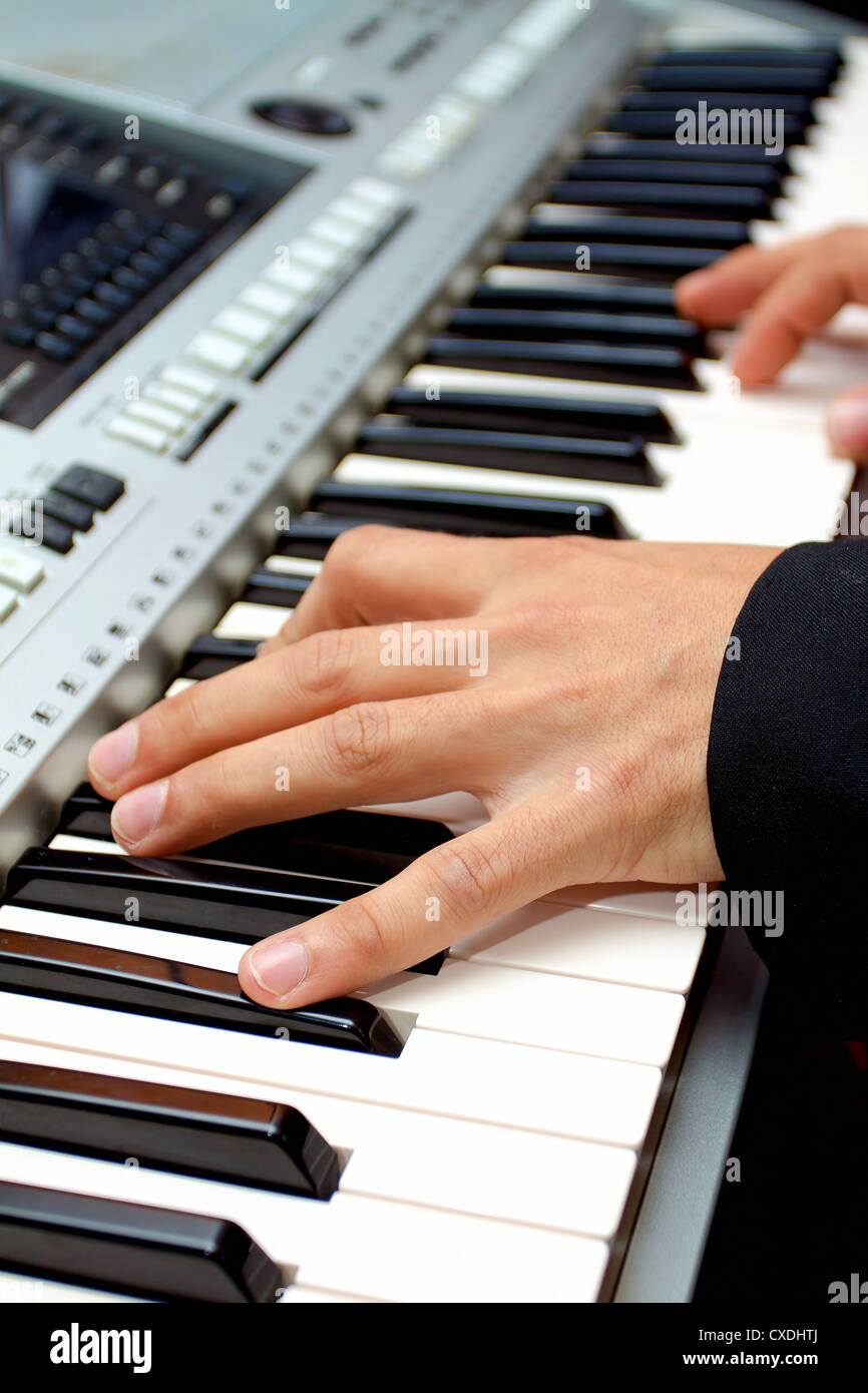 Artist hands of a piano player Stock Photo