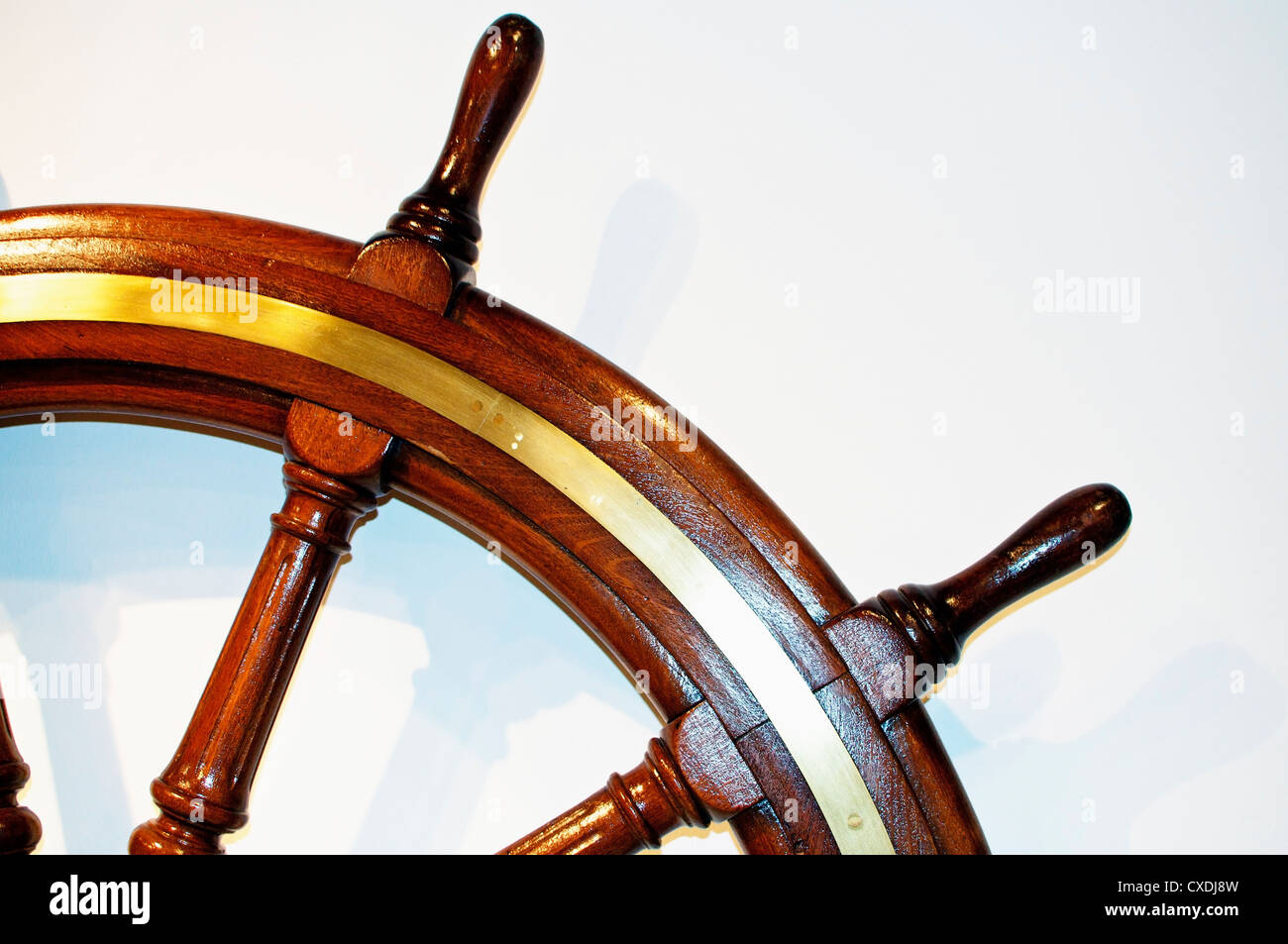Detail of a large, wooden ship's wheel Stock Photo