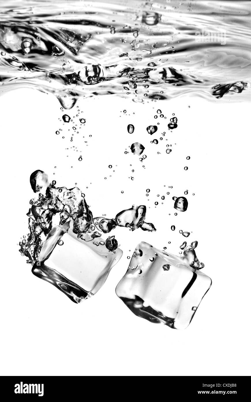 ice cubes dropped into water with splash isolated on white Stock Photo ...