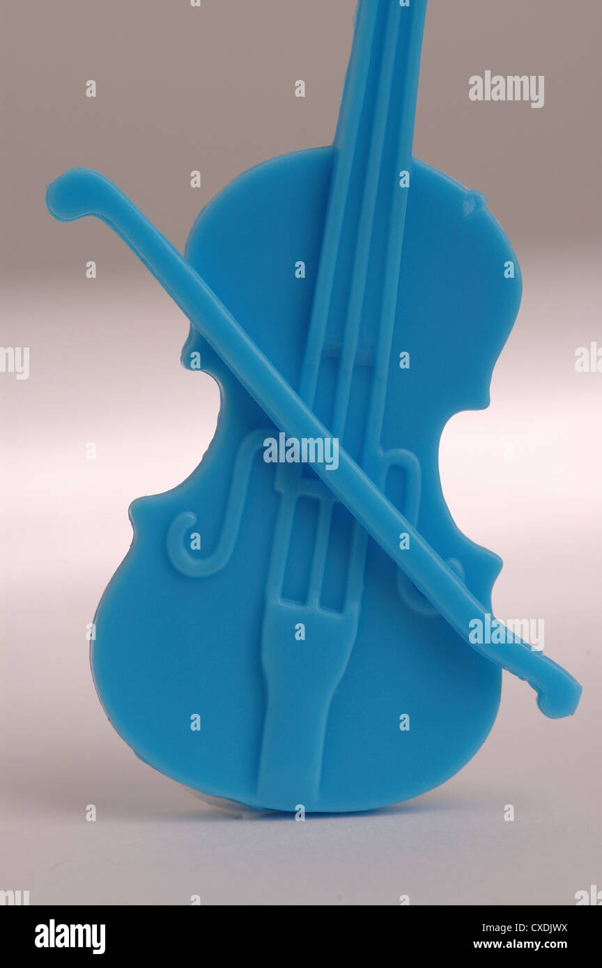close-up of plastic toy violin. Stock Photo