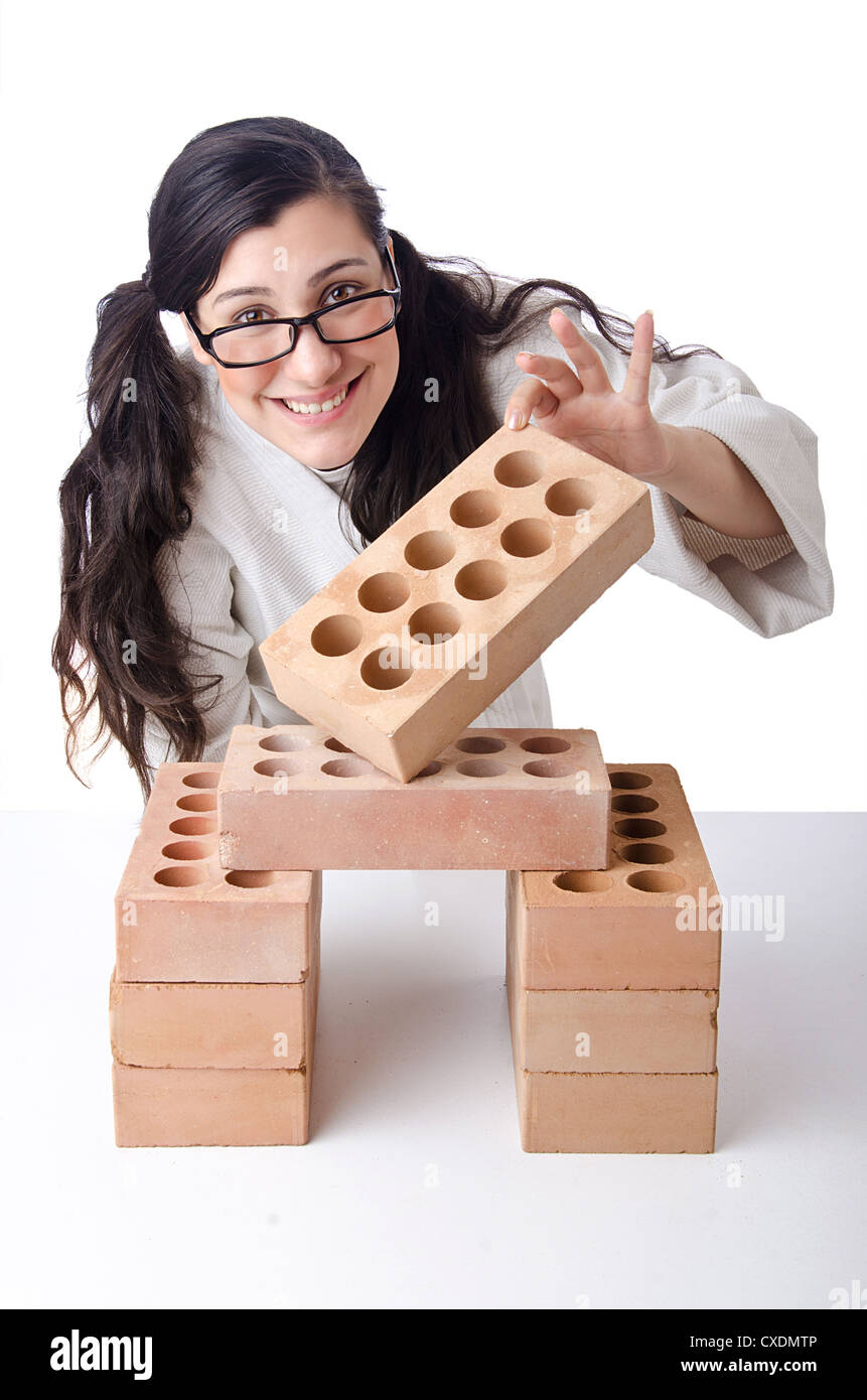 Woman karate breaking bricks on white Stock Photo Alamy