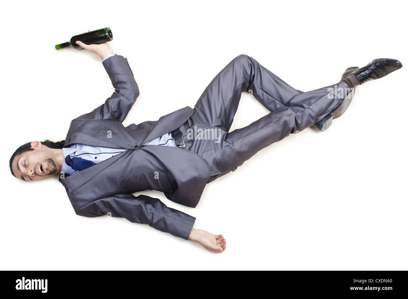 Drunk businessman on the floor Stock Photo Alamy