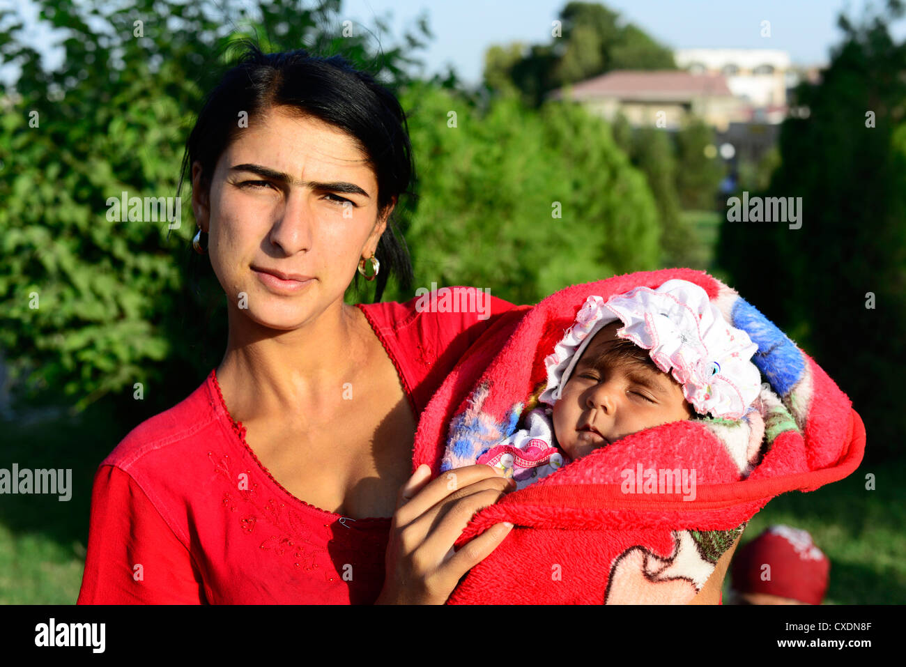 Gypsy woman with baby hi-res stock photography and images