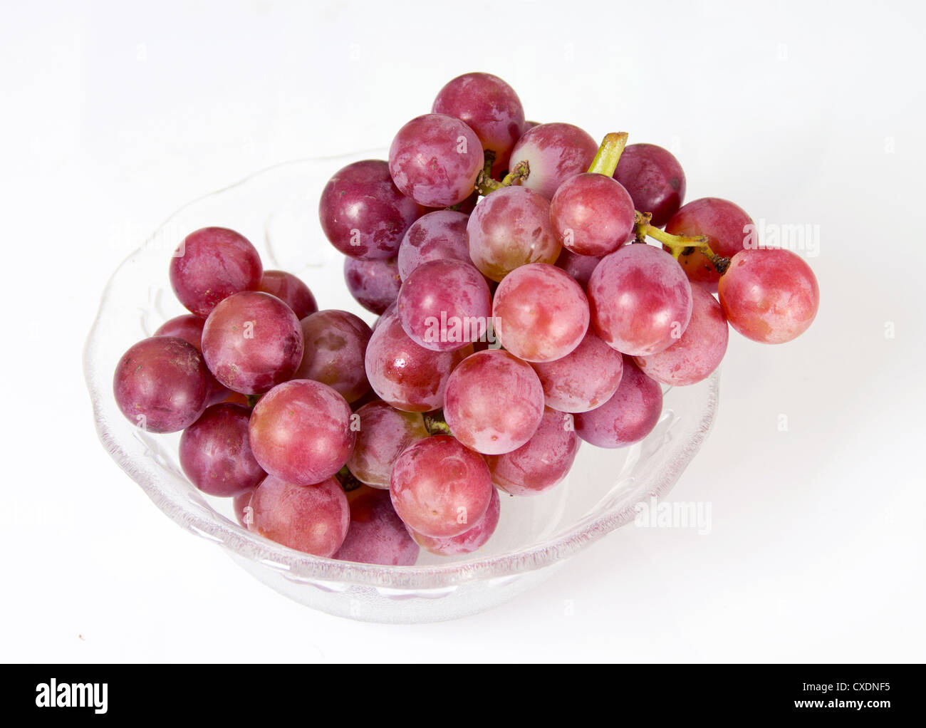 A cluster of grape grapes in glass bowl Stock Photo Alamy