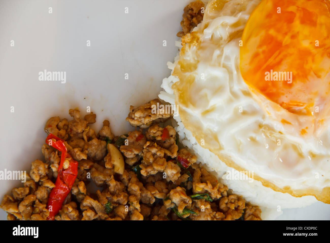 Pad Krapow Moo, spicy stirfried pork with fried egg and Thai holy