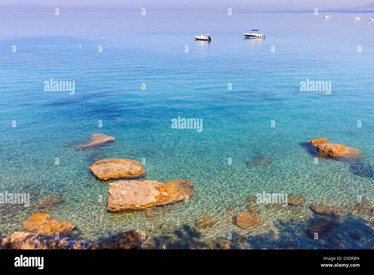 Beach rocks turquoise water hi-res stock photography and images - Alamy