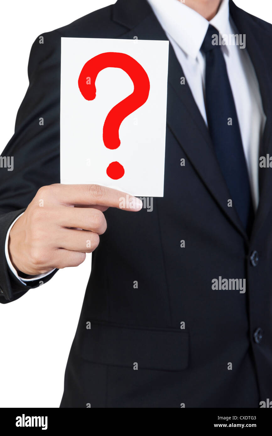 Businessman holding paper that show question mark symbol Stock Photo ...