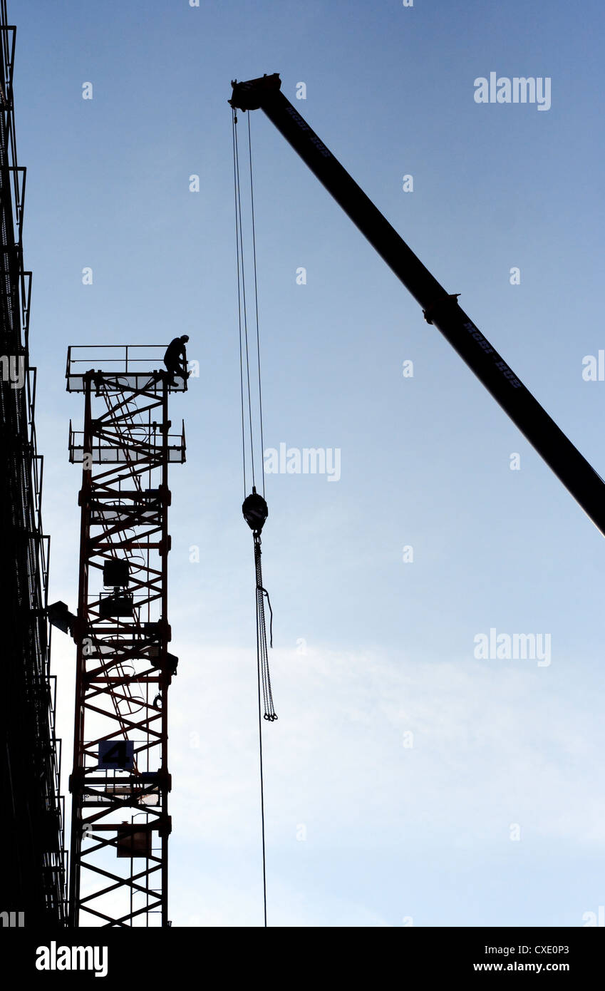 Berlin, silhouette of a construction worker on a scaffold Stock Photo