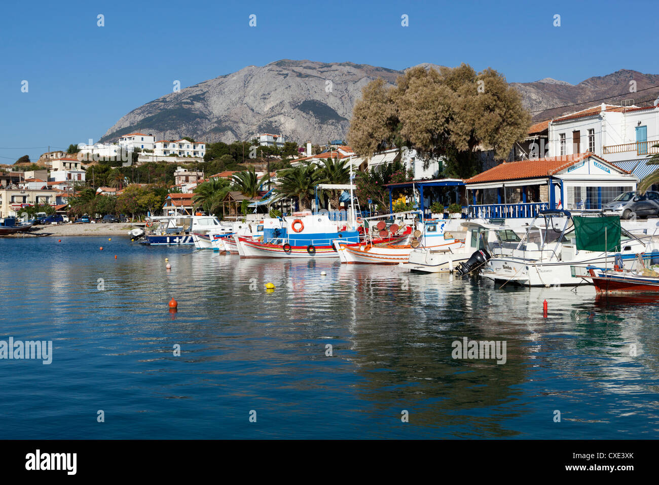 Fishing harbour and Mount Kerketeas, Ormos Marathokampos, Samos, Aegean Islands, Greece Stock Photo