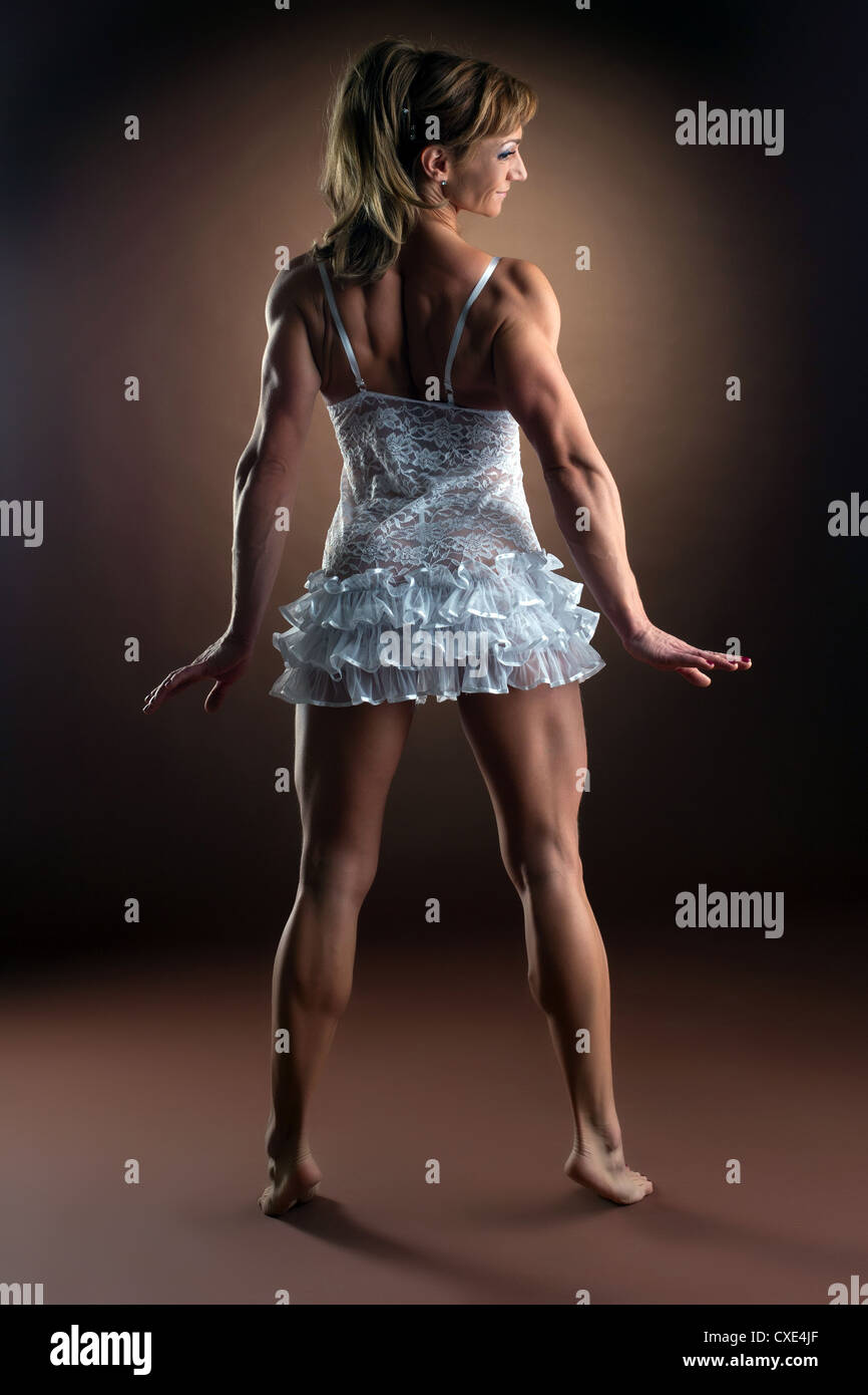 sexy woman body builder undress her ballet dress Stock Photo - Alamy