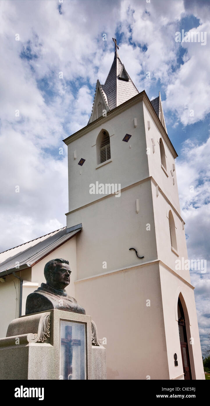 Father Leopold Moczygemba bust at grave in front of Immaculate Conception Catholic Church in Panna Maria, Texas, USA Stock Photo