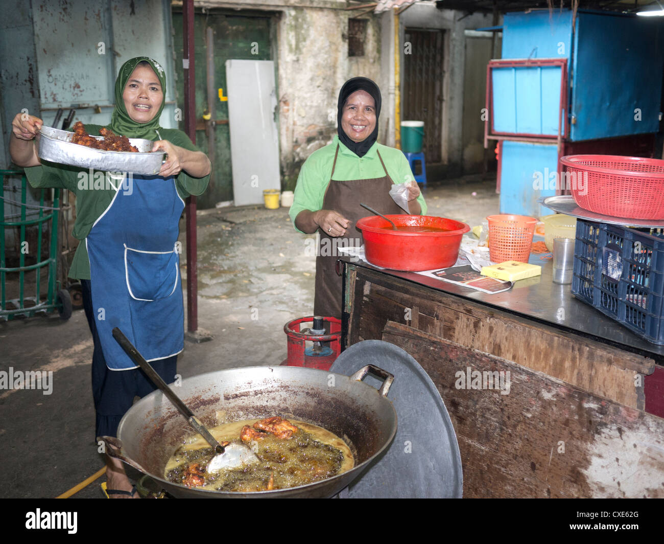 Women cooking in Street market, Little India, Kuala Lumpur, Malyasia Stock Photo