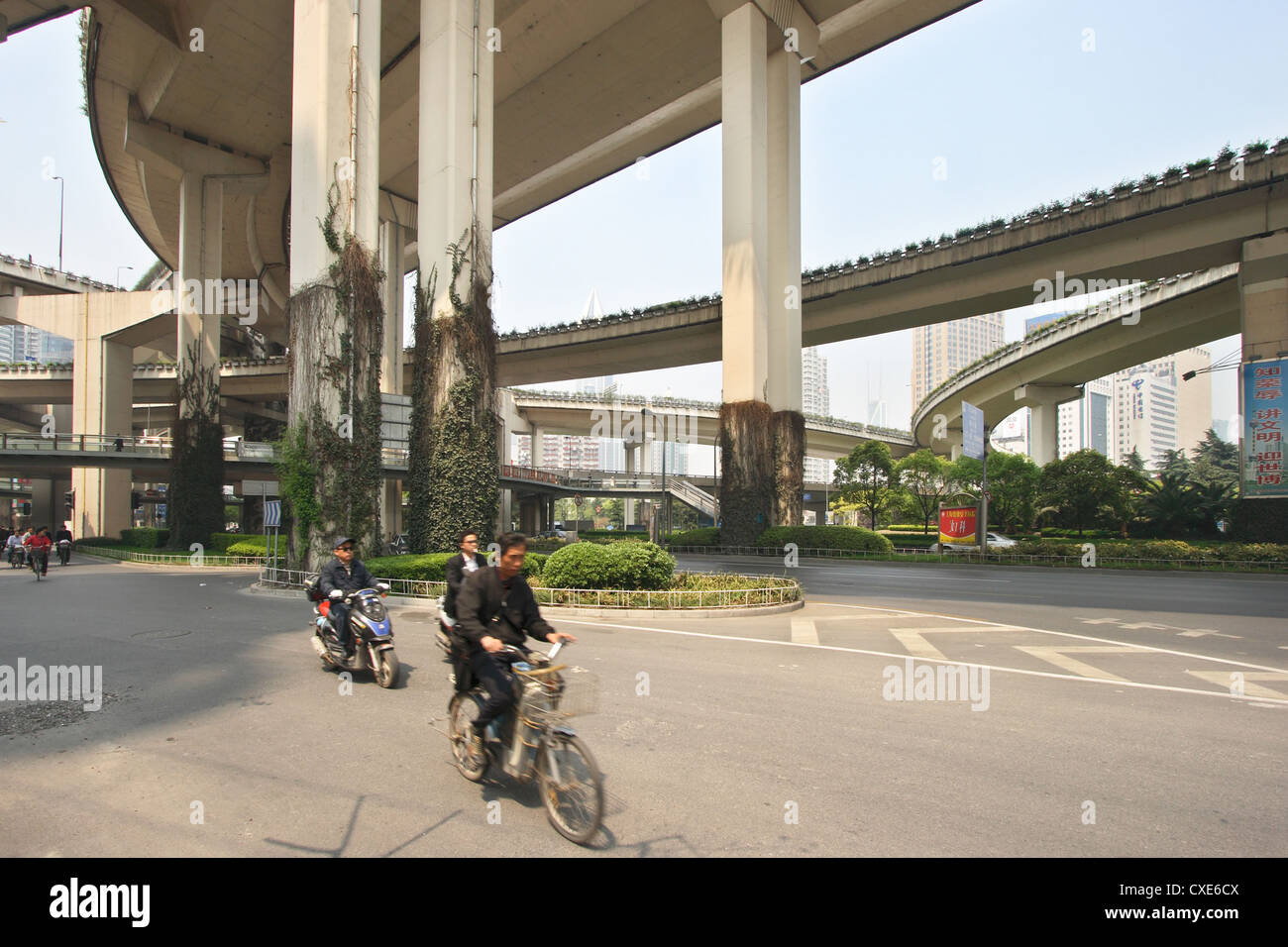 Two Wheel Inner City Shanghai, two-wheelers under high street Stock Photo - Alamy