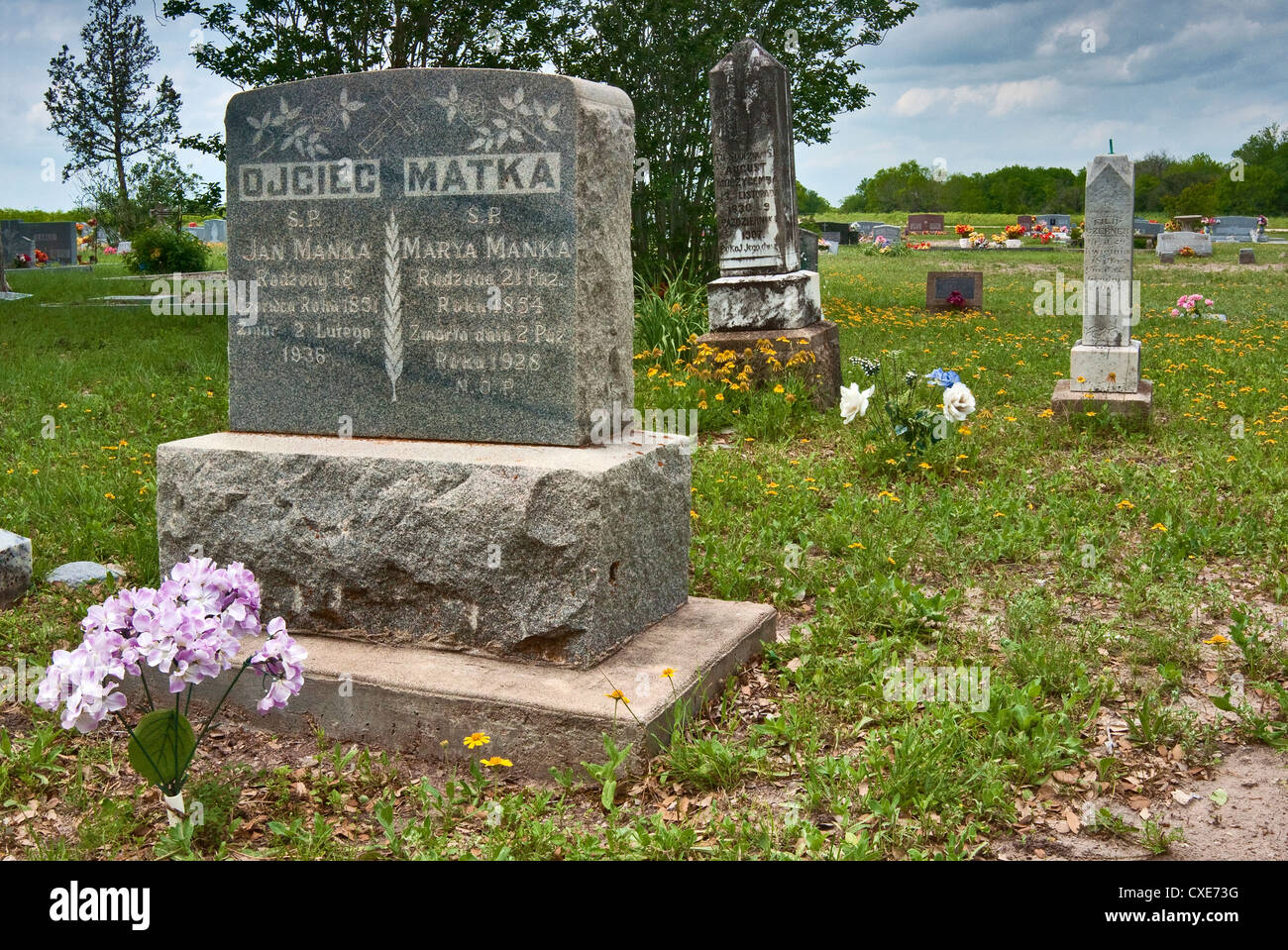 Early 20th century tombstones with Polish inscriptions at cemetery in Panna Maria, Texas, the oldest Polish settlement in the US Stock Photo