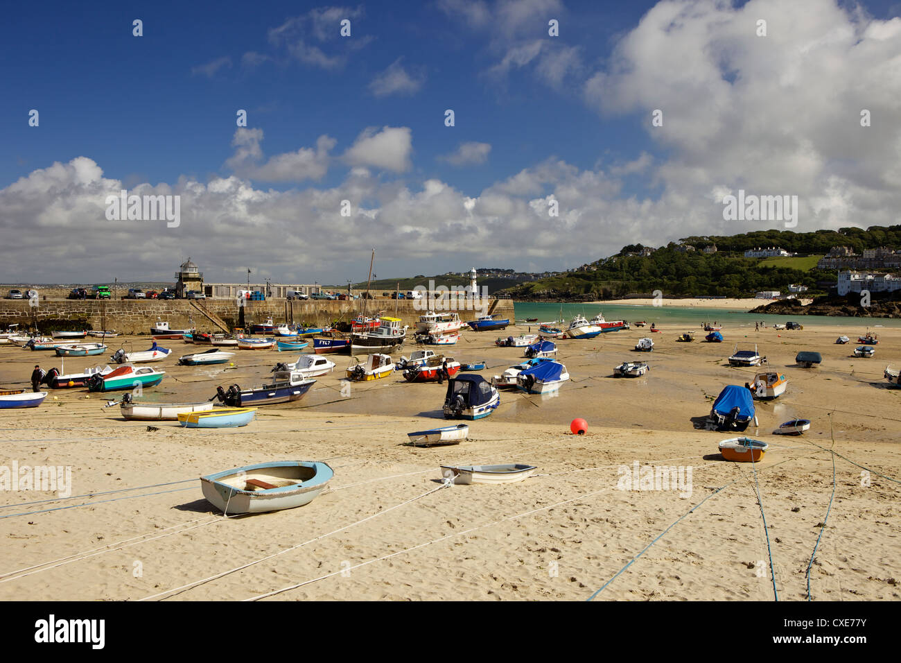 Boats in St Ives harbour at low tide, Cornwall, England Stock Photo Alamy