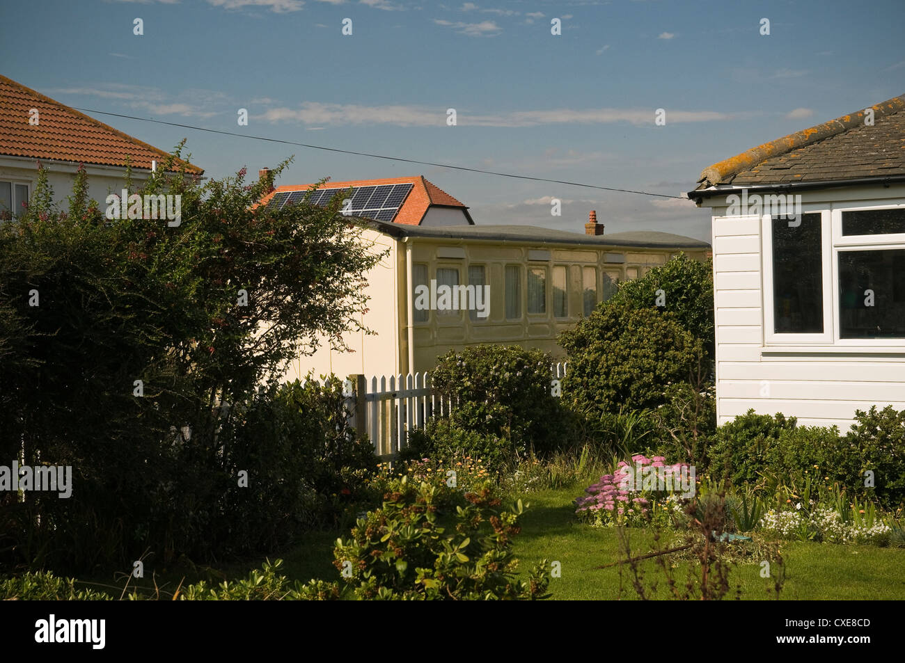 House created from old railway carriages in East Wittering, West Sussex, UK Stock Photo