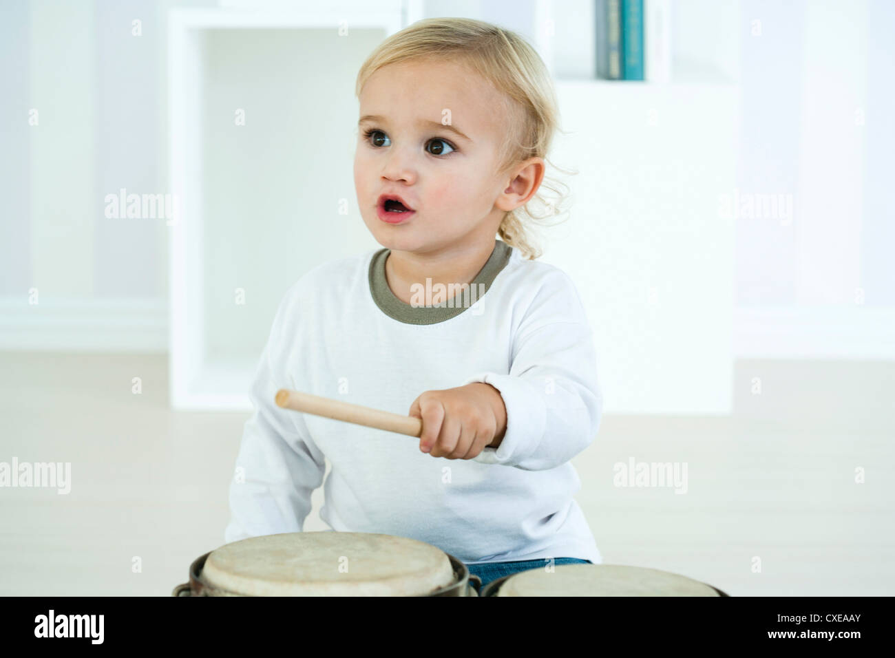Baby boy playing drums Stock Photo Alamy