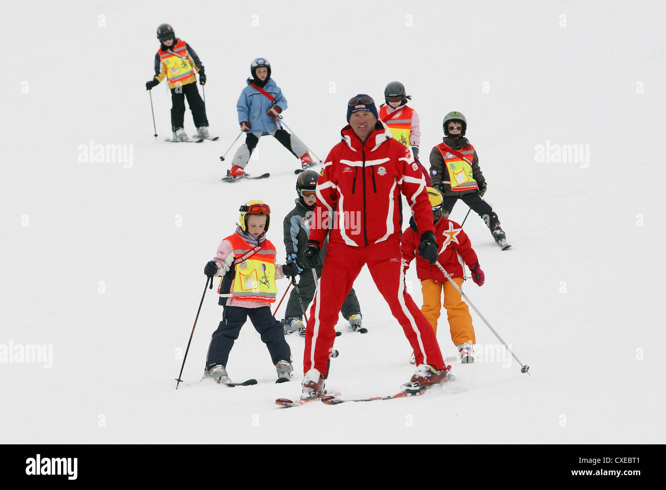Tyrol, children learn to ski Stock Photo
