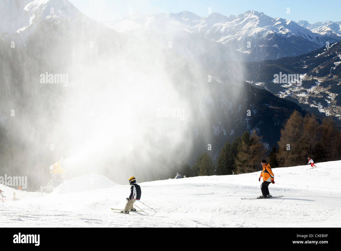 Tyrol, snow cannon sprayed fake snow on a ski slope Stock Photo Alamy