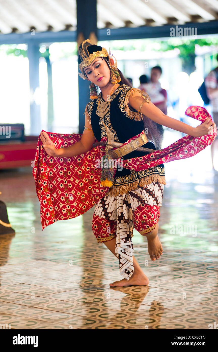 Woman performing a traditional Javanese palace dance at The Sultan's Palace (Kraton), Yogyakarta, Java, Indonesia Stock Photo
