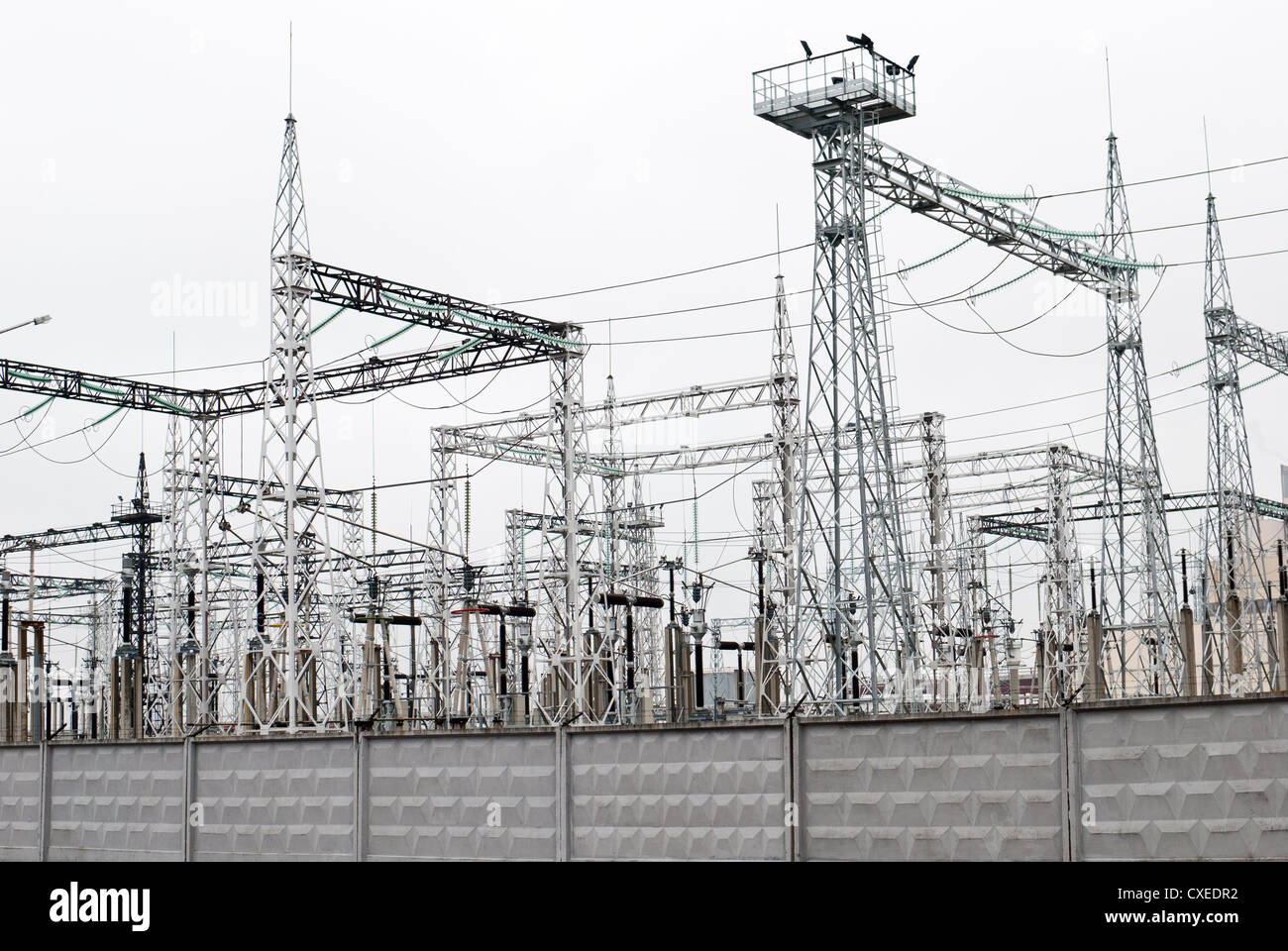 Power plant - transformation station. Multitude of cables and wires. Stock Photo