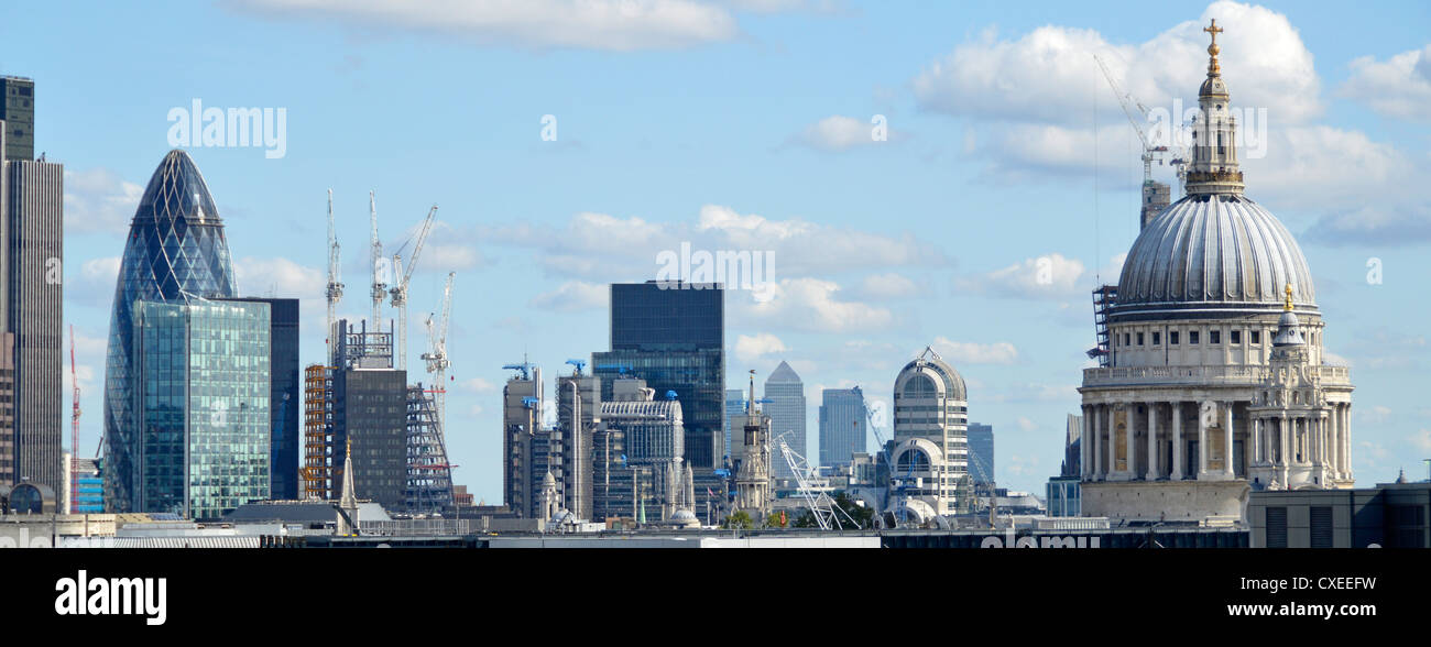 City of London skyline buildings including Tower 42, Gherkin, Lloyds, Canary Wharf distant, & Dome of St Pauls cathedral Stock Photo
