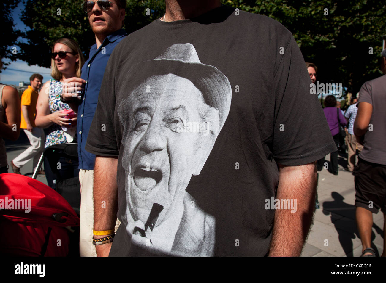 A t-shirt showing the laughing face of Carry On Films comedian and actor Sid James. He was known for his trademark 'dirty laugh' and lascivious persona. London, UK. Stock Photo