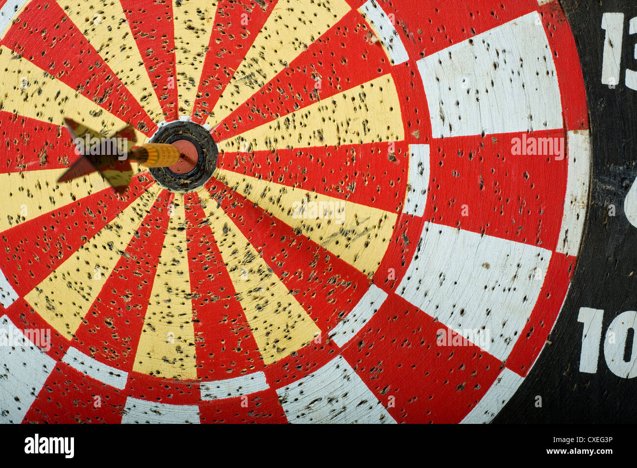 A dart in the bullseye on a dartboard with copy space Stock Photo Alamy