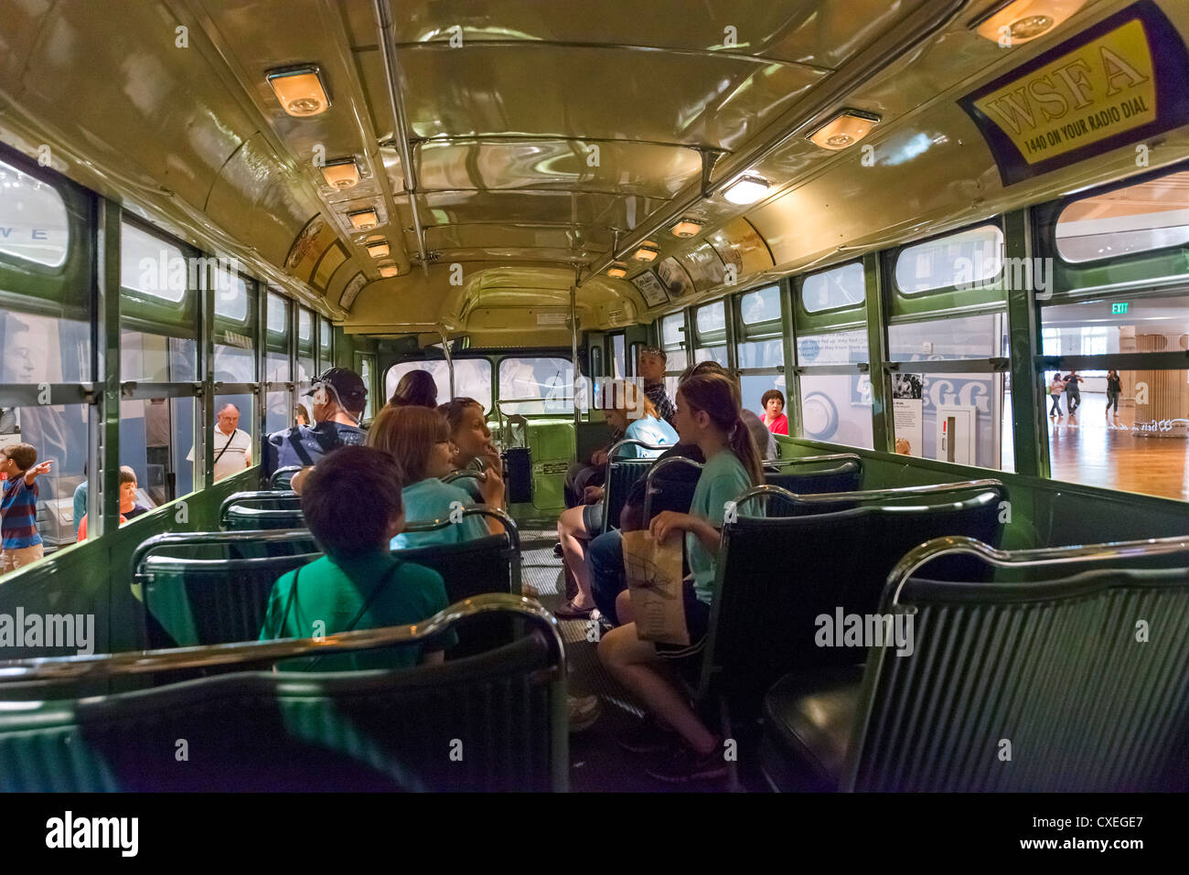 Tourists on the bus on which Rosa Parks refused to give up her seat, The Henry Ford Museum, Dearborn, Detroit, Michigan, USA Stock Photo
