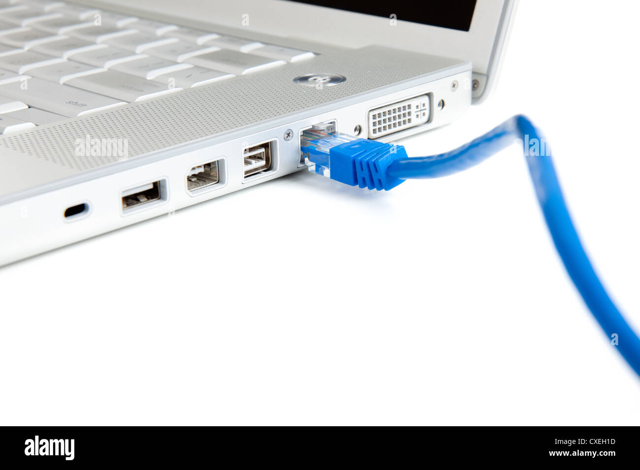 An Internet Ethernet cord plugged into a computer on a white backgroudn  Stock Photo - Alamy