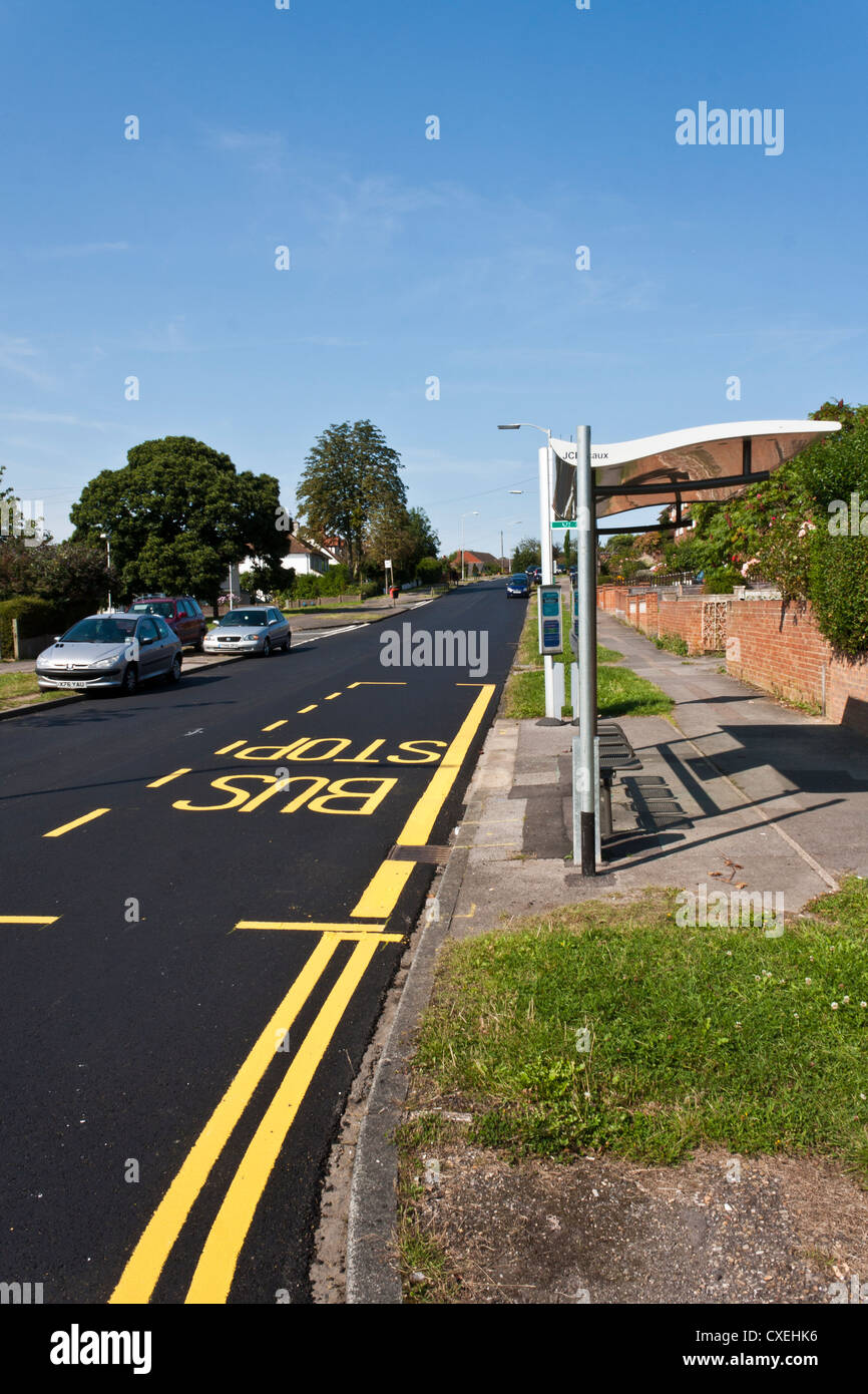 Newly painted lines on a freshly tarmacked road Stock Photo Alamy