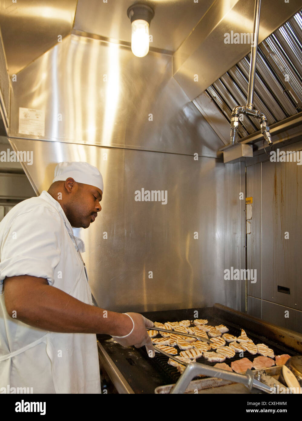 Kitchen Worker Prepares Lunch for Patients at Henry Ford Hospital Stock