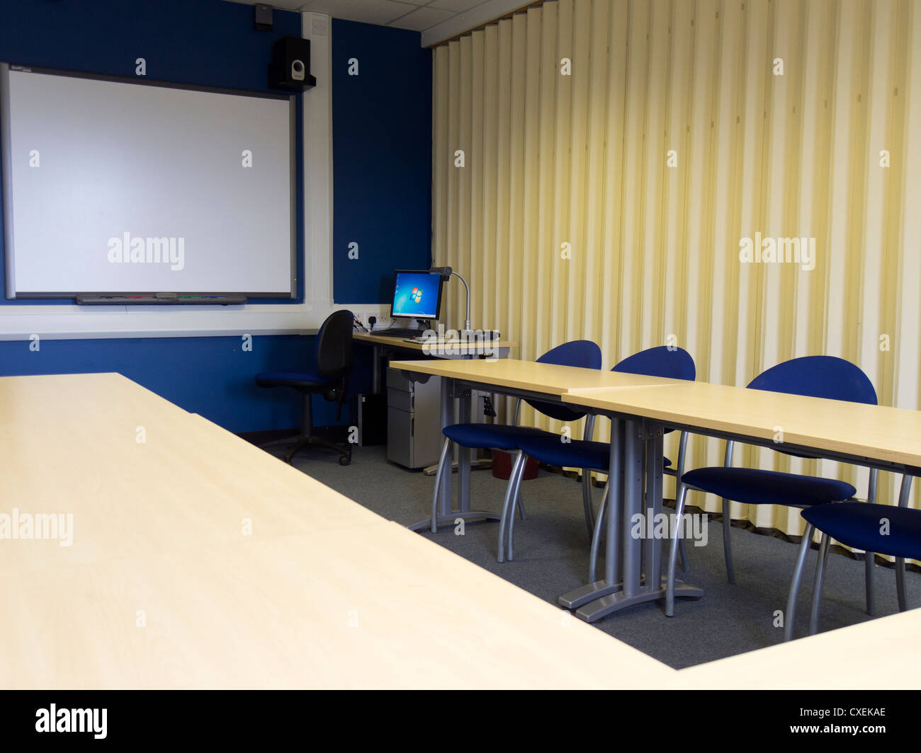 Modern classroom with smartboard technology. Stock Photo