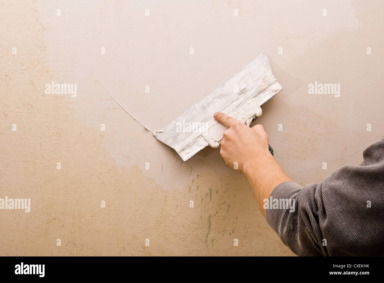 Filling walls. House repair. Stock Photo