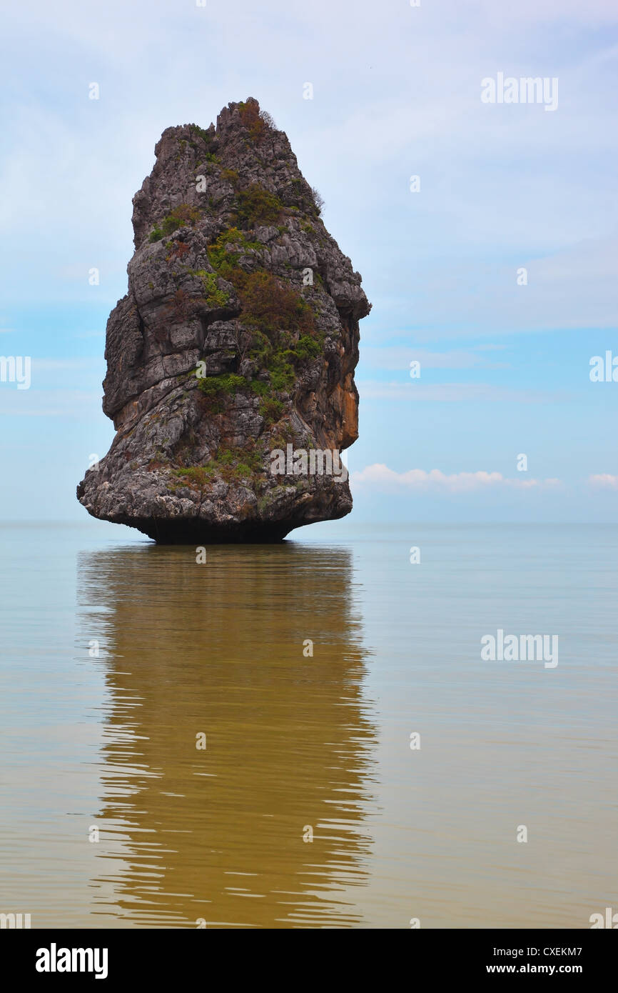 The Sail Rock floats in a fog Stock Photo