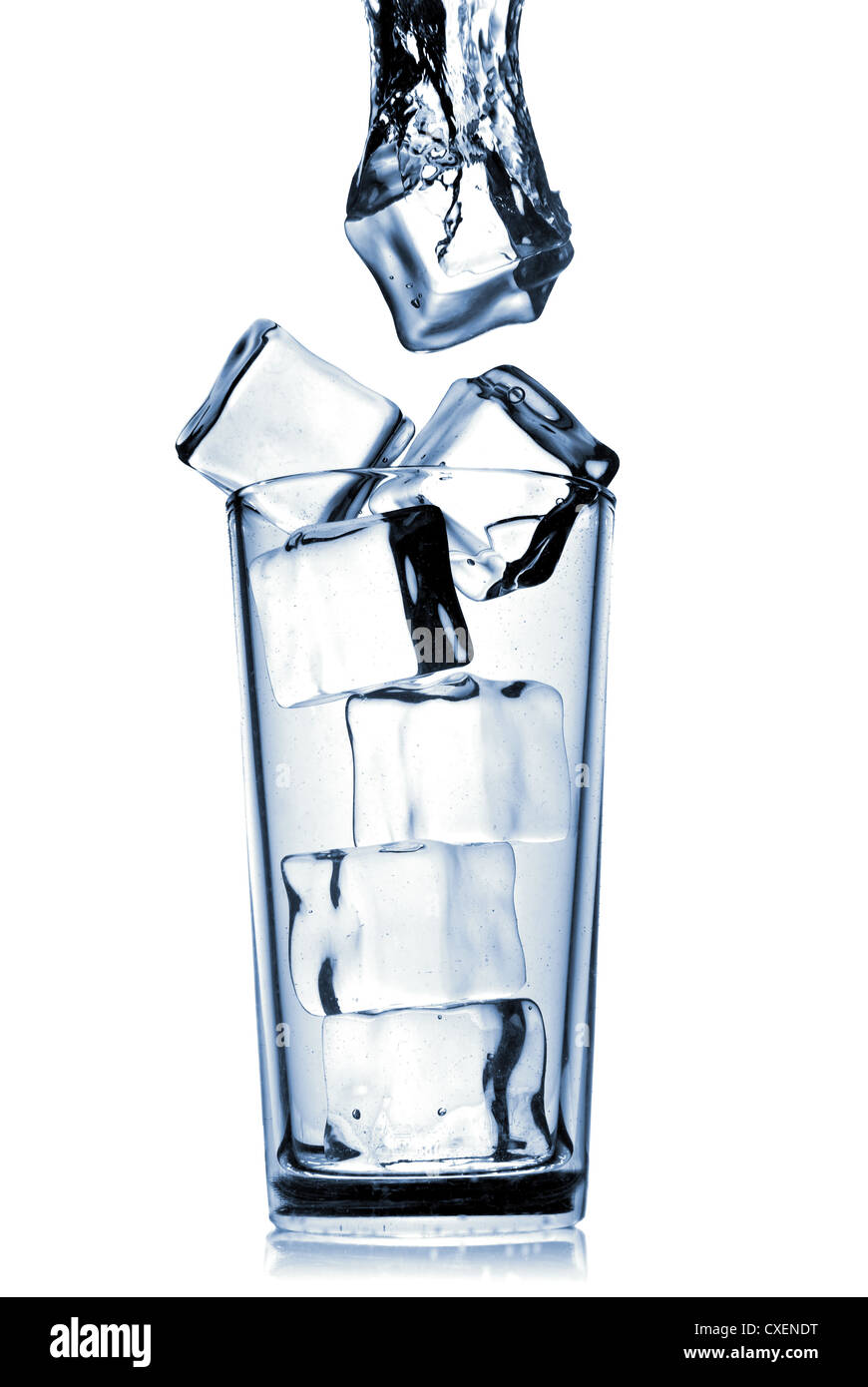 ice cubes dropped into glass with bubbles isolated on white Stock Photo ...