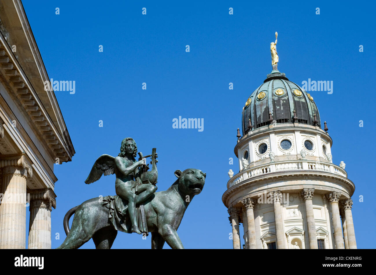 Dome of the French Cathedral on the Gendarmenmarkt in Berlin, Germany, with the Konzerthaus concert hall on the left. Stock Photo