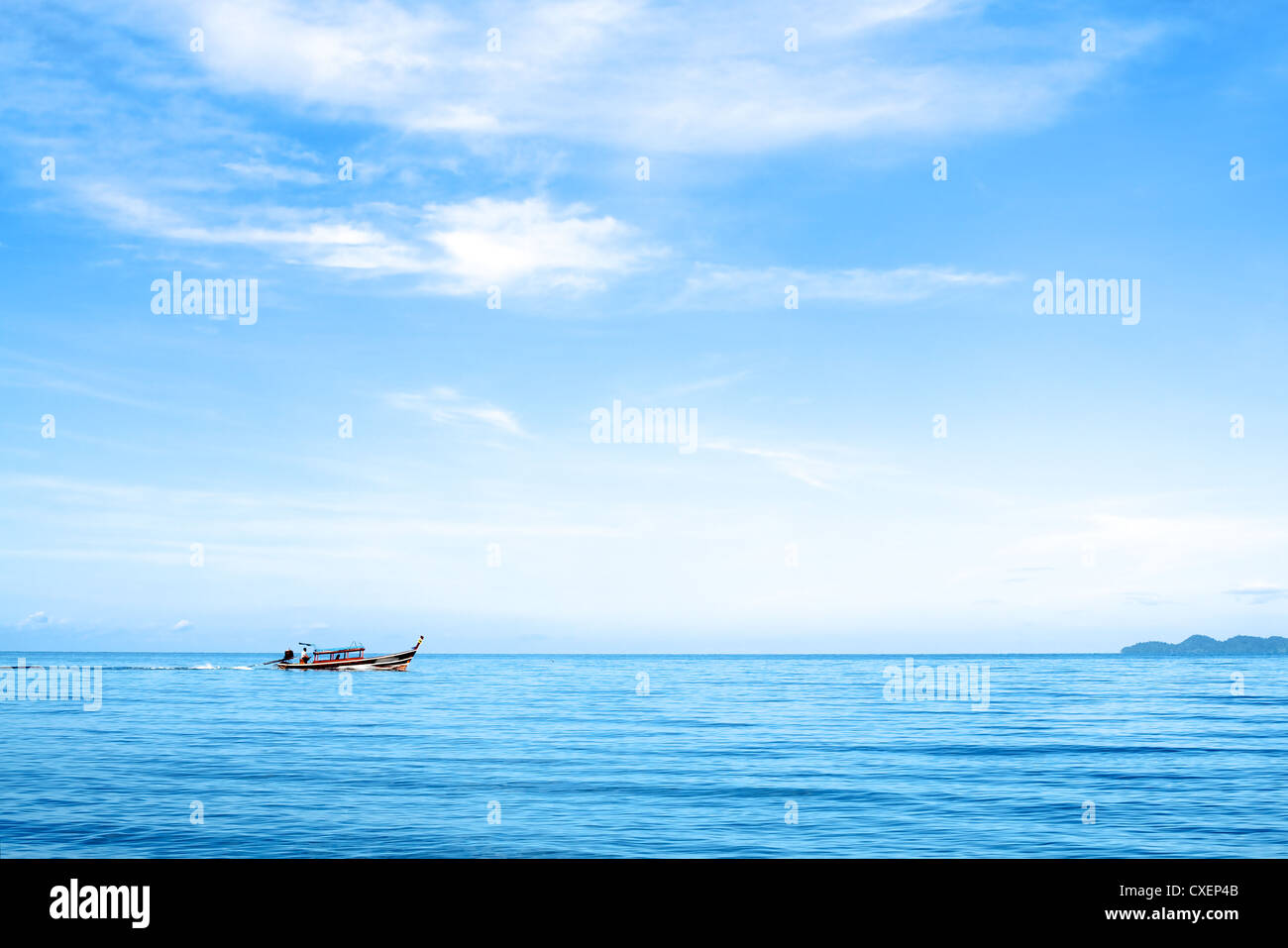 Island in azure sea boat hi-res stock photography and images - Alamy
