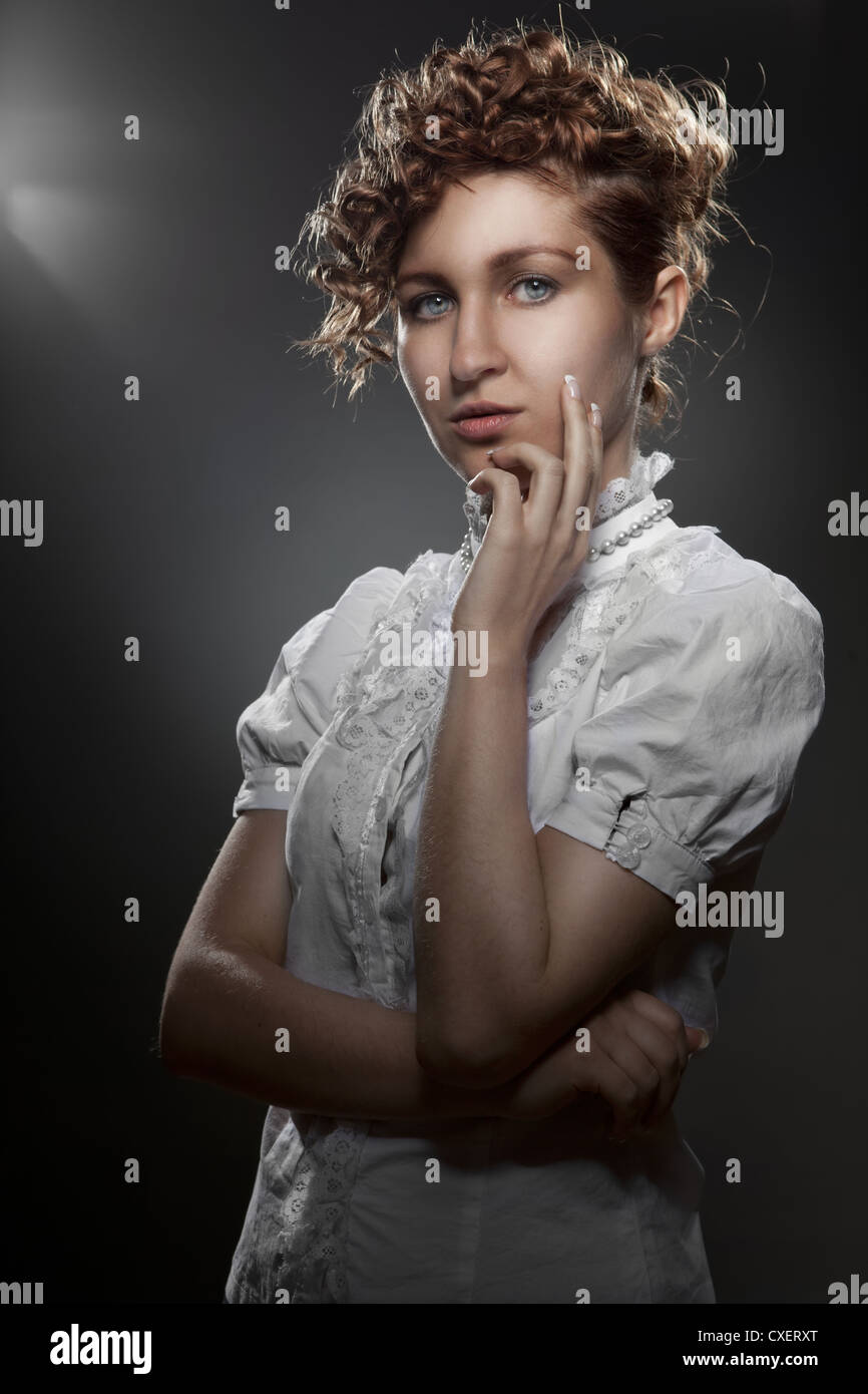 Portrait of young beautiful woman on black Stock Photo - Alamy