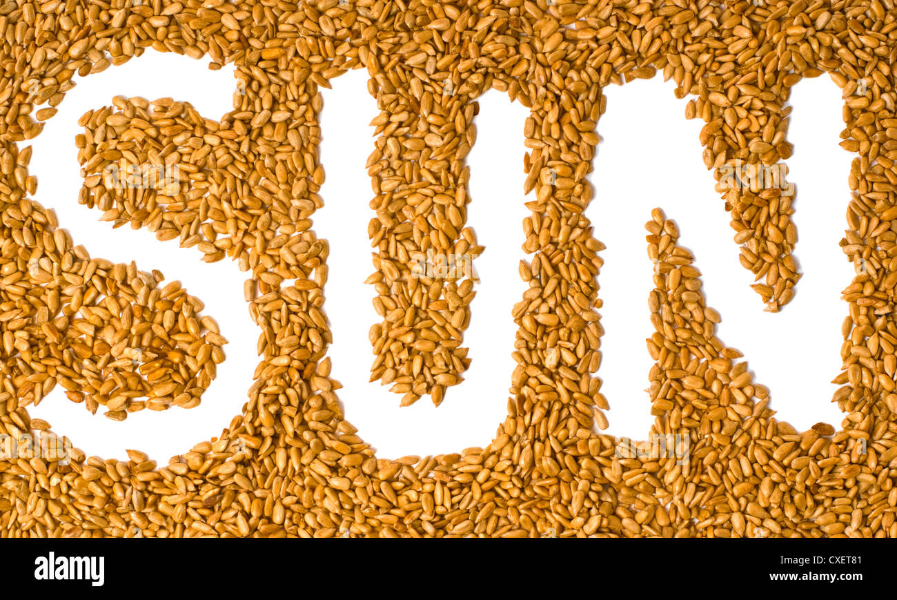 sunflower seeds with written word sun Stock Photo Alamy