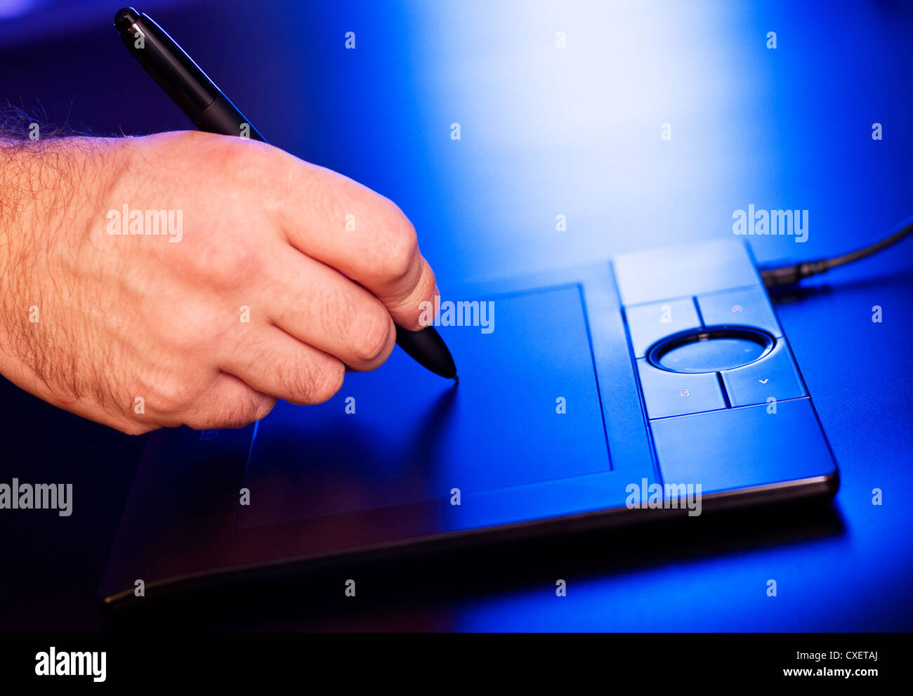 man's hand on drawing tablet Stock Photo Alamy