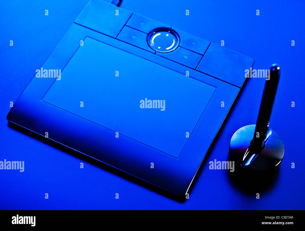 drawing tablet in blue light Stock Photo