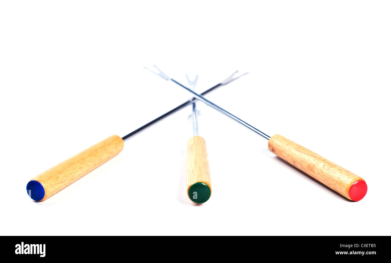 colored fondue forks Stock Photo - Alamy