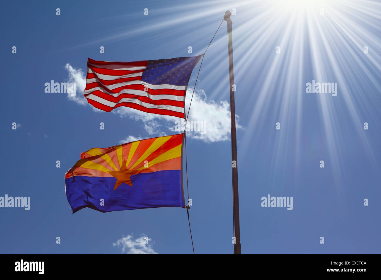 Flags are flying against the shining sun Stock Photo